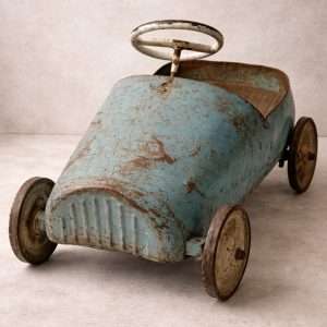 Cochecito infantil antiguo de metal