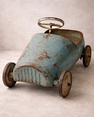 Cochecito infantil antiguo de metal